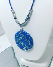 Tranquil Elegance: Blue Jasper Agate Pendant on Genuine Leather with Silver Accents